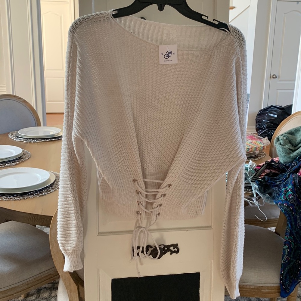 Cream sweater.